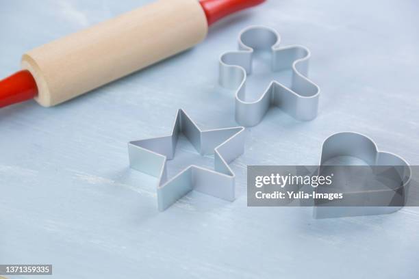 three metal cookie cutters of different shapes - pastry cutter bildbanksfoton och bilder