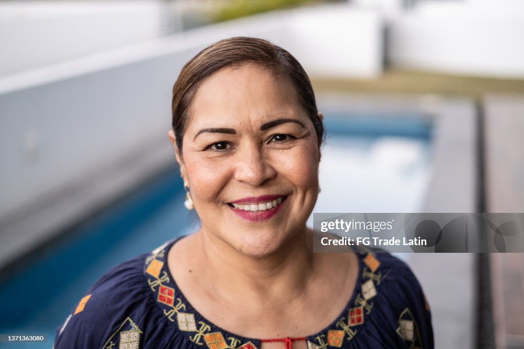 Portrait of a mature Latin woman at home
