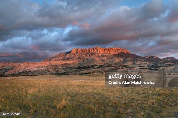 castle reef mountain sun canyon montana - montana moody sky stock pictures, royalty-free photos & images