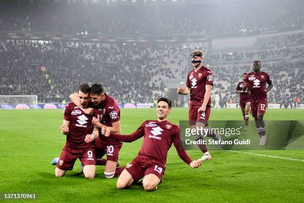 Andrea Belotti of Torino FC and Sasa Lukic of Torino FC and Josip Brekalo of Torino FC celebrates a goal during the Serie A match between Juventus...