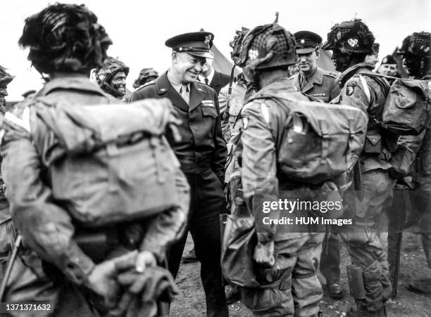 World War II Photo - Gen. Dwight D. Eisenhower gives the order of the day, Full victory, nothing less to paratroopers somewhere in England just...