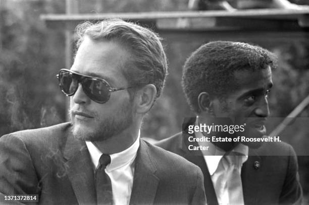 Close-up of American actors Paul Newman and Sammy Davis Jr during the March on Washington for Jobs and Freedom, Washington DC, August 28, 1963.