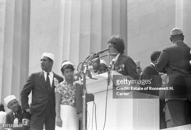 American-born French singer, dancer, and actress Josephine Baker speaks from a podium on the steps of the Lincoln Memorial during the March on...
