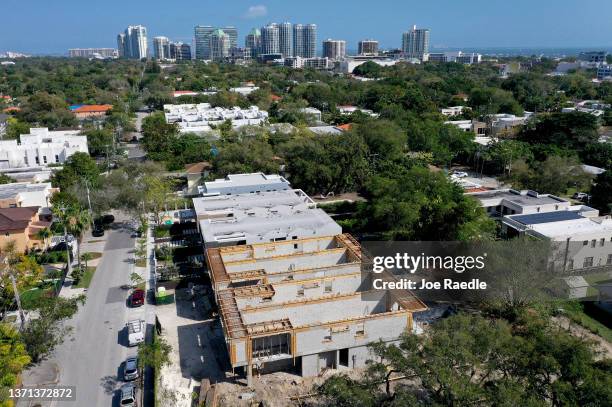 In an aerial view, homes that, once constructed according to area sales, would fetch over a million dollars each are under construction in the...