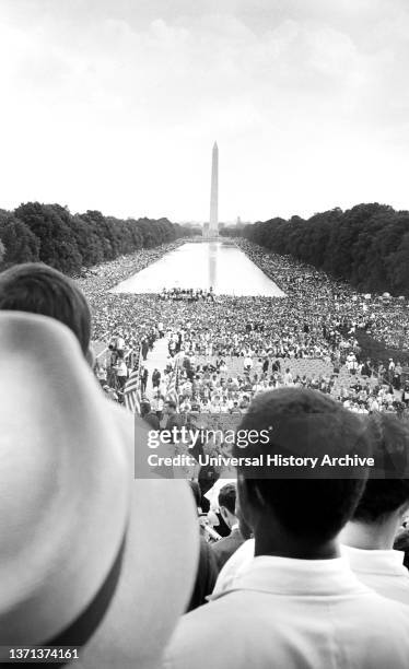 Crowd surrounding Reflecting Pool and with Washington Monument in background, March on Washington for Jobs and Freedom, Washington, DC, USA, Warren...