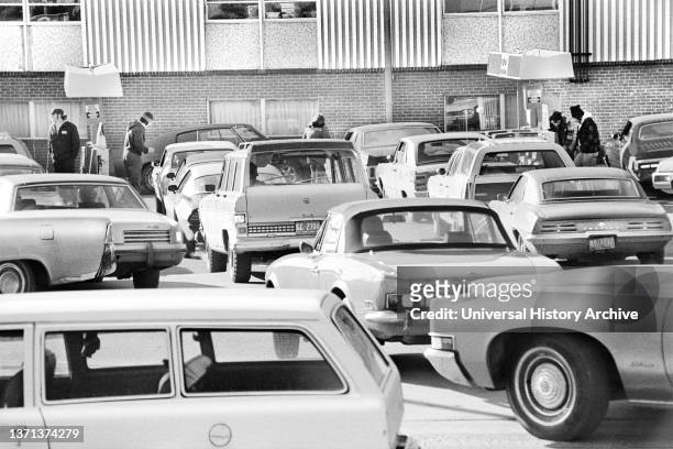 Cars lined up at a gas station in Maryland, USA, during the oil crisis of 1973-74, February 1974.