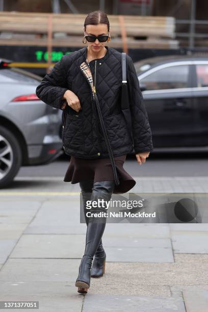 Irina Shayk is seen arriving to the Crypt at St Martin-In-The-Fields for the Matty Bovan show during London Fashion Week February 2022 on February...