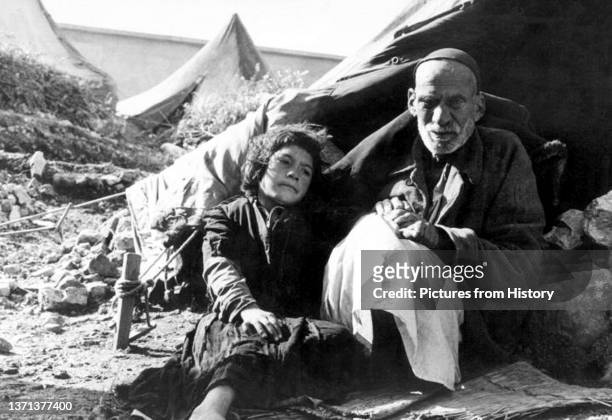 Palestinian father and daughter driven from their homes by Israeli forces, 1948. Hanini .