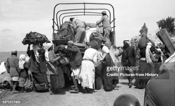 Palestinian men, women and children driven from their homes by Israeli forces, 1948.
