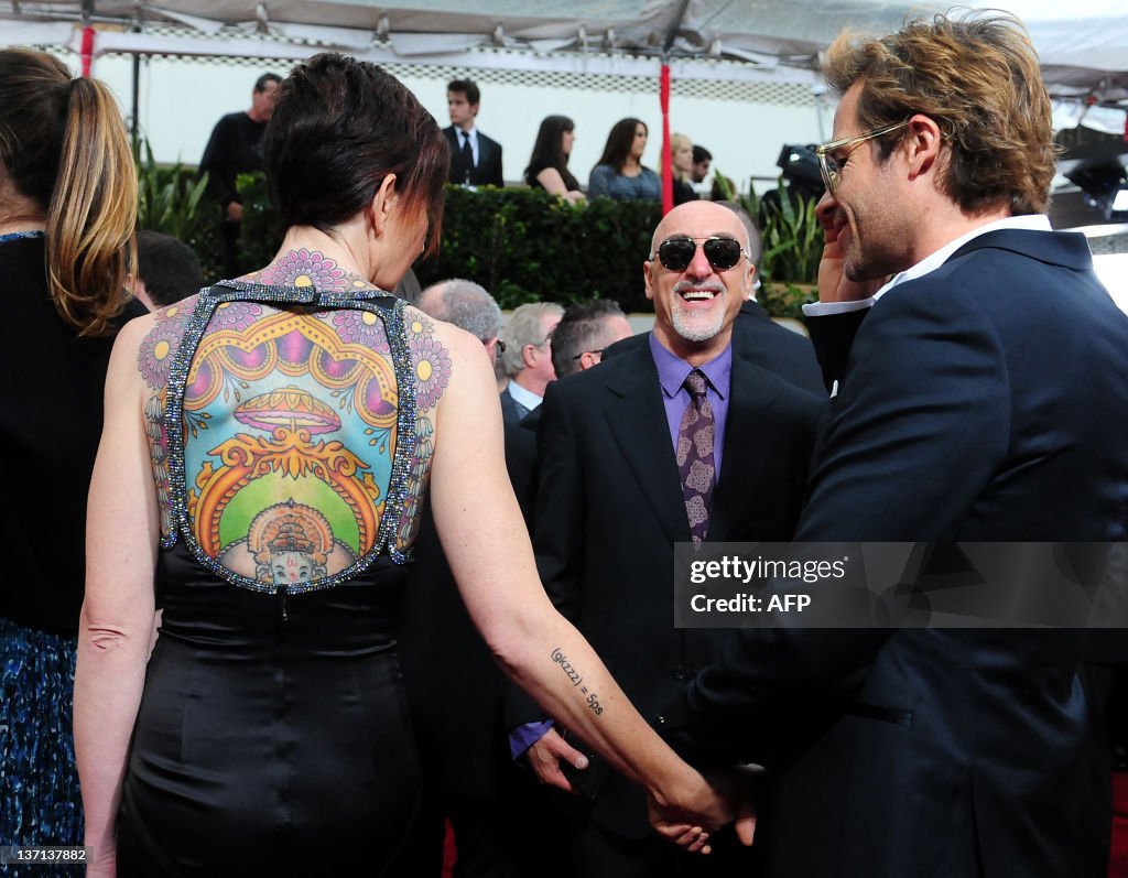 Actor Guy Pearce and wife Kate Mestitz arrive on the red carpet for