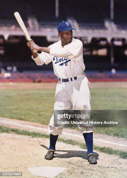 Jackie Robinson , Major League Baseball Player, full-length Portrait wearing Brooklyn Dodgers Uniform, Harry Warnecke, 1947.