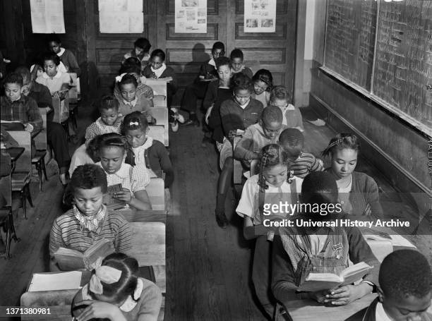 Overcrowded Classroom due to enlargement of Fort Bragg, Fayetteville, North Carolina, USA, Jack Delano, U.S. Farm Security Administration, U.S....