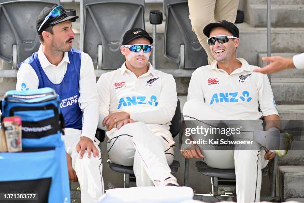 Hamish Rutherford, Tom Latham and Tim Southee of New Zealand look on prior to day three of the First Test Match in the series between New Zealand and...