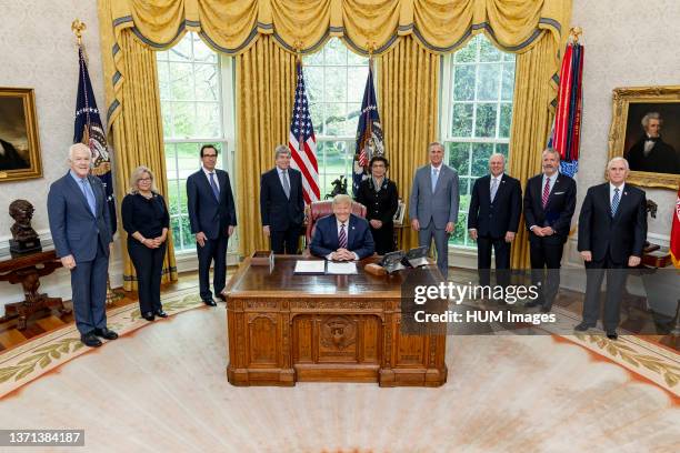 President Donald Trump joined by Vice President Mike Pence Cabinet members and senior legislators prior to signing H.R. 266 ‰ÛÒ the Paycheck...