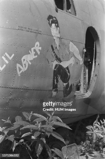 American Aircraft Graveyard, Drawing of muscular man with caption Lil Abner; Date November 10, 1947; Location Indonesia, Dutch East Indies.