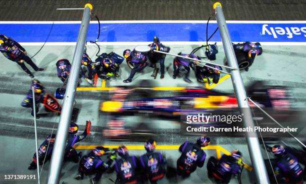 Photographed from above with an elevated view, German Red Bull Racing Formula One racing team racing driver Sebastian Vettel driving his RB9 racing...