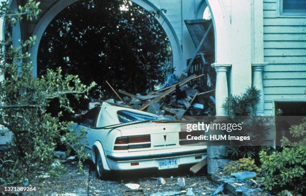 House on the southern tip of Charleston fared well during the storm. However, the car was not as luckyAfter passage of Hurricane Hugo ca. September...