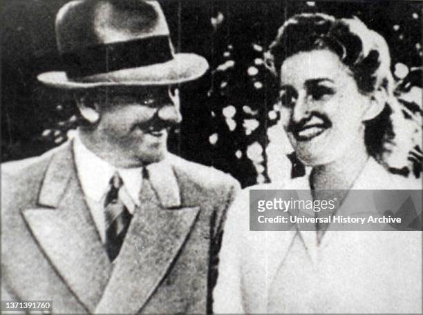 Adolf Hitler with Eva Braun long-time companion and his later his wife. Braun met Hitler in Munich when she was a 17-year-old assistant and model for...