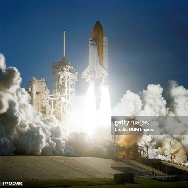 Space Shuttle Endeavour lifts off into an afternoon sky to begin the STS-108 mission December 5, 2001.