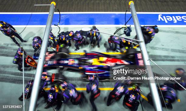 Photographed from above with an elevated view, German Red Bull Racing Formula One racing team racing driver Sebastian Vettel driving his RB9 racing...