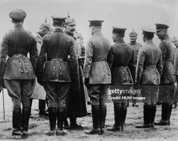 Kaiser Wilhelm II of Germany giving iron cross medal to aviators during World War I ca. 1914-1915.