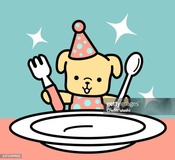 a cute dog wearing a party hat and holding a knife and fork and looking at a big empty plate waiting for food - dog biscuit stock illustrations