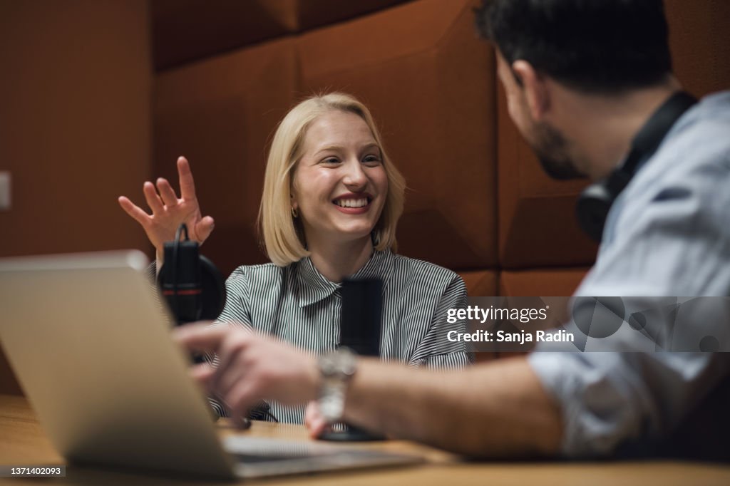Lady Host Example Young Female Host Smiling While Recording A Podcast Episode High-Res ...