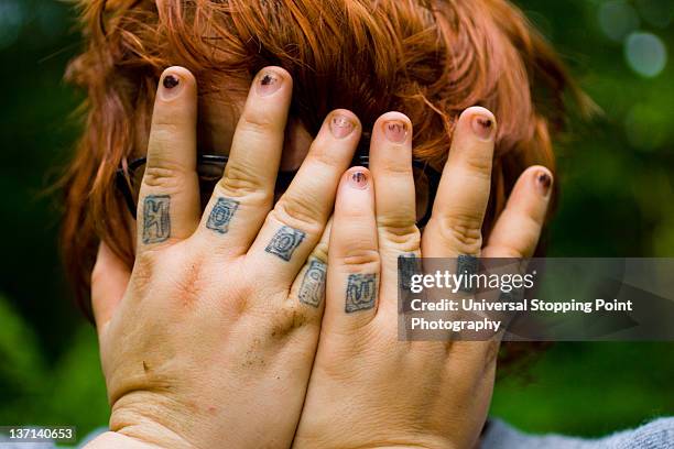 bashful finger tattoos - auburn v kentucky stock pictures, royalty-free photos & images