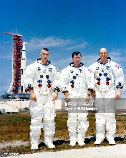 Prime crew of Apollo 10 sits for photo while at Kennedy Space Center for preflight training. L to R are astronauts Eugene A. Cernan, John W. Young,...