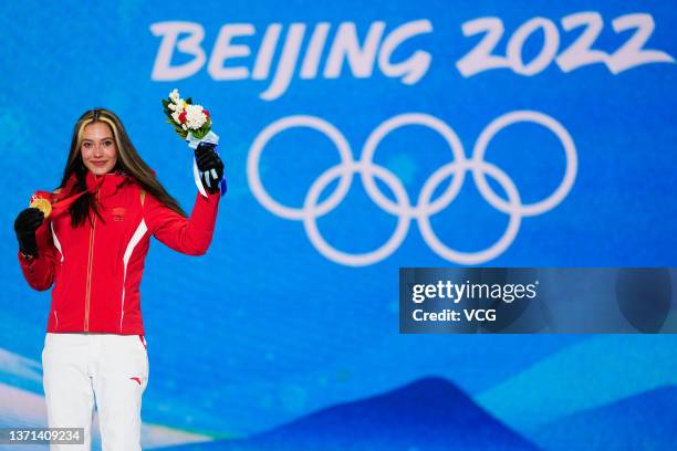 Gold medallist Ailing Eileen Gu of Team China poses with her medal during the Women's Freeski Halfpipe medal ceremony on Day 14 of the Beijing 2022...