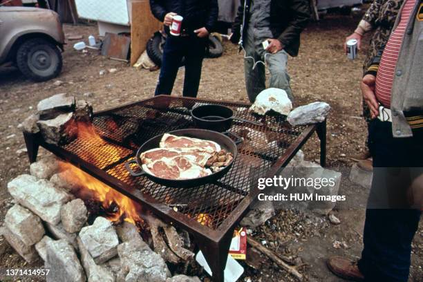 Texas November 1972 - Deer Hunters Prepare Their Evening Meal at the Permanent Camp They Have Constructed near Wild Deer Feeding Places. 11/1972.