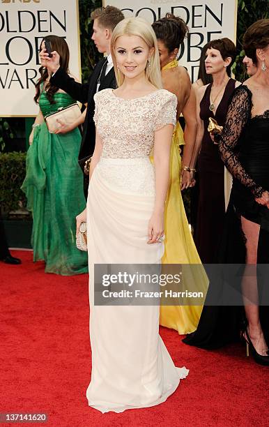 Singer Mika Newton arrives at the 69th Annual Golden Globe Awards held at the Beverly Hilton Hotel on January 15, 2012 in Beverly Hills, California.