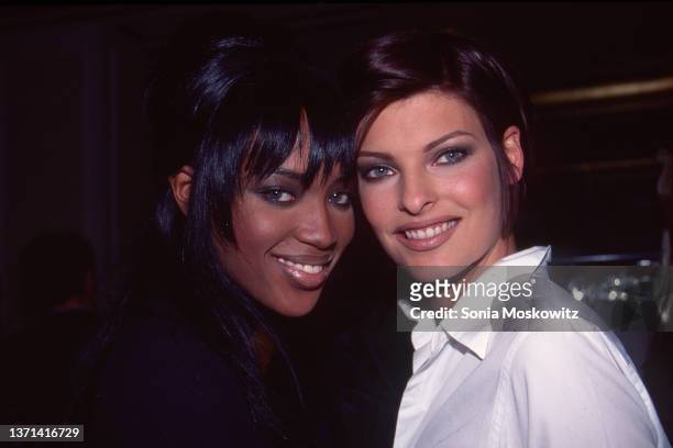 Linda Evangelista and Naomi Campbell attend a Marc Jacobs fashion show in New York City in 1995.