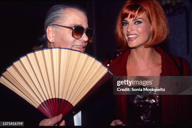 Linda Evangelista and Karl Lagerfeld attend a Chanel fashion event in New York City on September 12,1991.