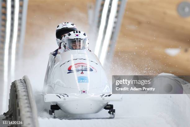 Yunjong Won, Jinsu Kim, Hyunwoo Jung and Donghyun Kim of Team South Korea slide during the four-man Bobsleigh heats on day 15 of Beijing 2022 Winter...