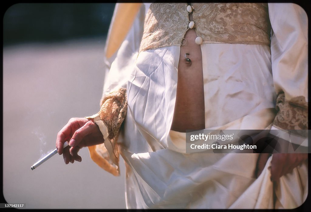 Woman holding cigarette