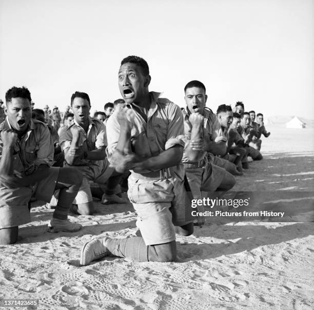 Soldiers of the 28th Maori Battalion perform a haka at Helwan, June 1941.