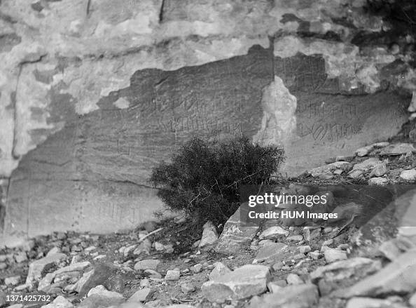 Original Caption: Petra. El-Farasah & obelisk ridge area. Nabatean inscription. Obelisk ridge above Wady Farasah - Location: Petra Jordan ca. 1920