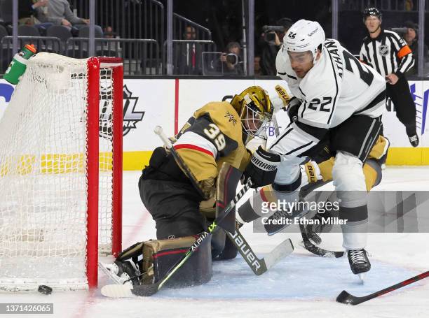Laurent Brossoit of the Vegas Golden Knights defends the net against Andreas Athanasiou of the Los Angeles Kings in the first period of their game at...