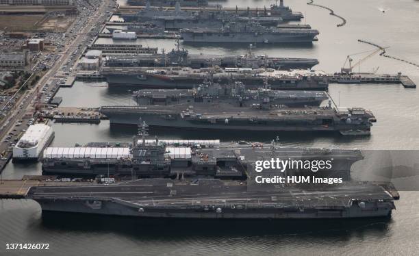 The aircraft carriers USS Dwight D. Eisenhower , USS George H.W. Bush , USS Enterprise , USS Harry S. Truman , and USS Abraham Lincoln are in port at...