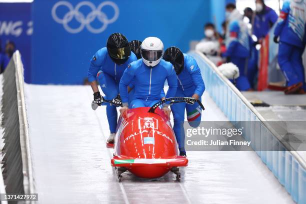 Mattia Variola, Robert Mircea, Alex Pagnini and Jose Delmas Obou of Team Italy slide during the four-man Bobsleigh heats on day 15 of Beijing 2022...