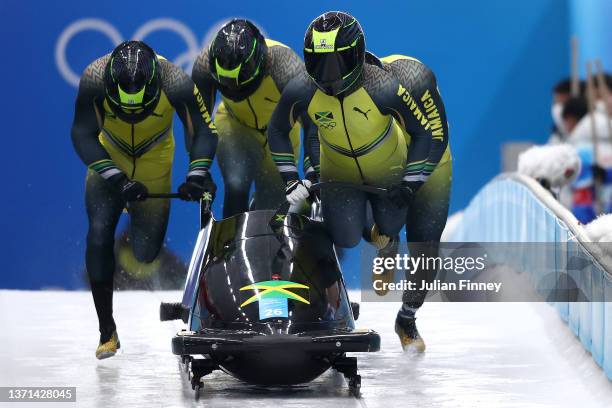 Shanwayne Stephens, Ashley Watson, Rolando Reid and Matthew Wekpe of Team Jamaica slide during the four-man Bobsleigh heats on day 15 of Beijing 2022...