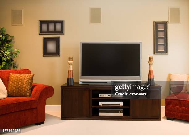 widescreen television in family room - modern tv room stock pictures, royalty-free photos & images