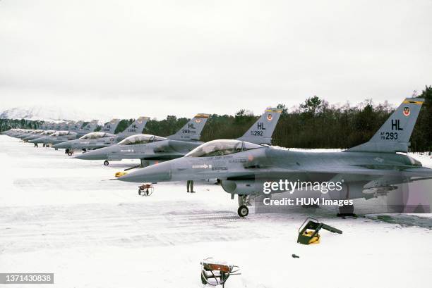 Left side view of a row of F-16 Fighting Falcon aircraft from the 4th Tactical Fighter Squadron.