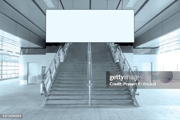 blank white banner at subway station. - fake advertisement stock pictures, royalty-free photos & images