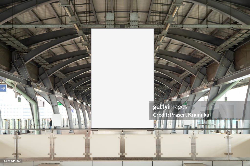 Blank white banner at subway station.