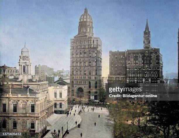 United States of America, at the City Hall Park in New York, on the left the Town Hall, the tallest building with the dome, the newspaper World, a...