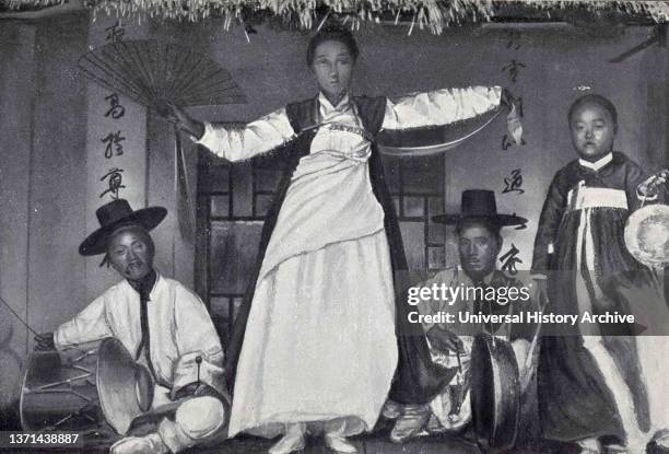 Black and white photo from a book of a fair magician in Korea.