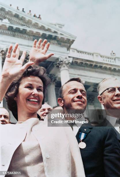 --- Astronaut Alan B. Shepard Jr. , along with wife Louise, waves to a crowd outside the U.S. Capitol building. Mercury-Redstone 3 astronaut.