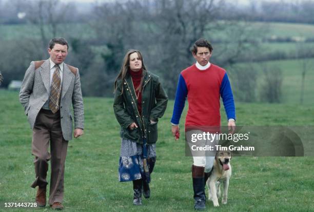 Royal Protection Officer John McLean, Lady Jane Wellesley, girlfriend of Prince Charles, with British Royal Charles, Prince of Wales, walking his...